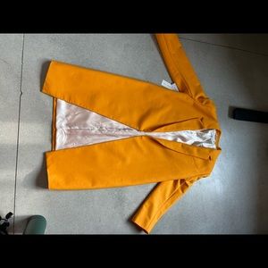 Be the centre of attention w this statement piece coat